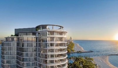 A luxury high rise condo building overlooking the ocean