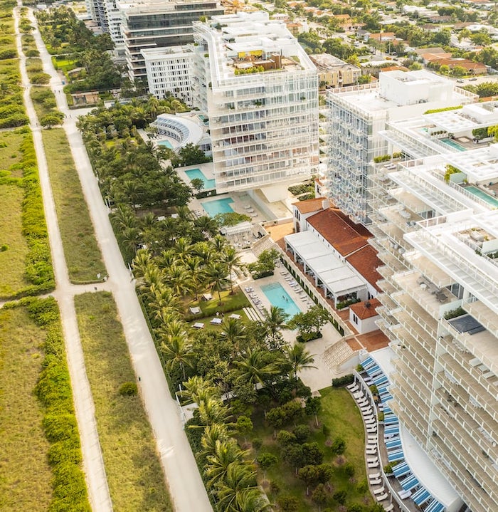 Aerial view of homes next to the water